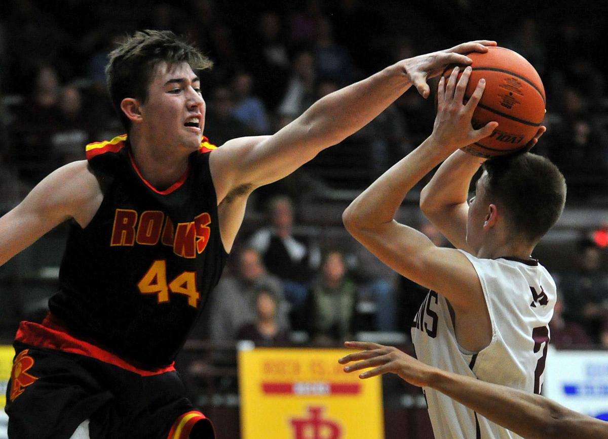 Rock Island Struggles But Runs Away From Moline Basketball