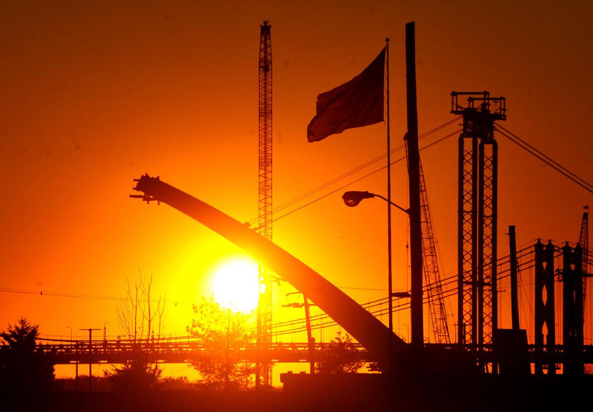 Sunset behind the new Interstate 74 bridge construction in Bettendorf.