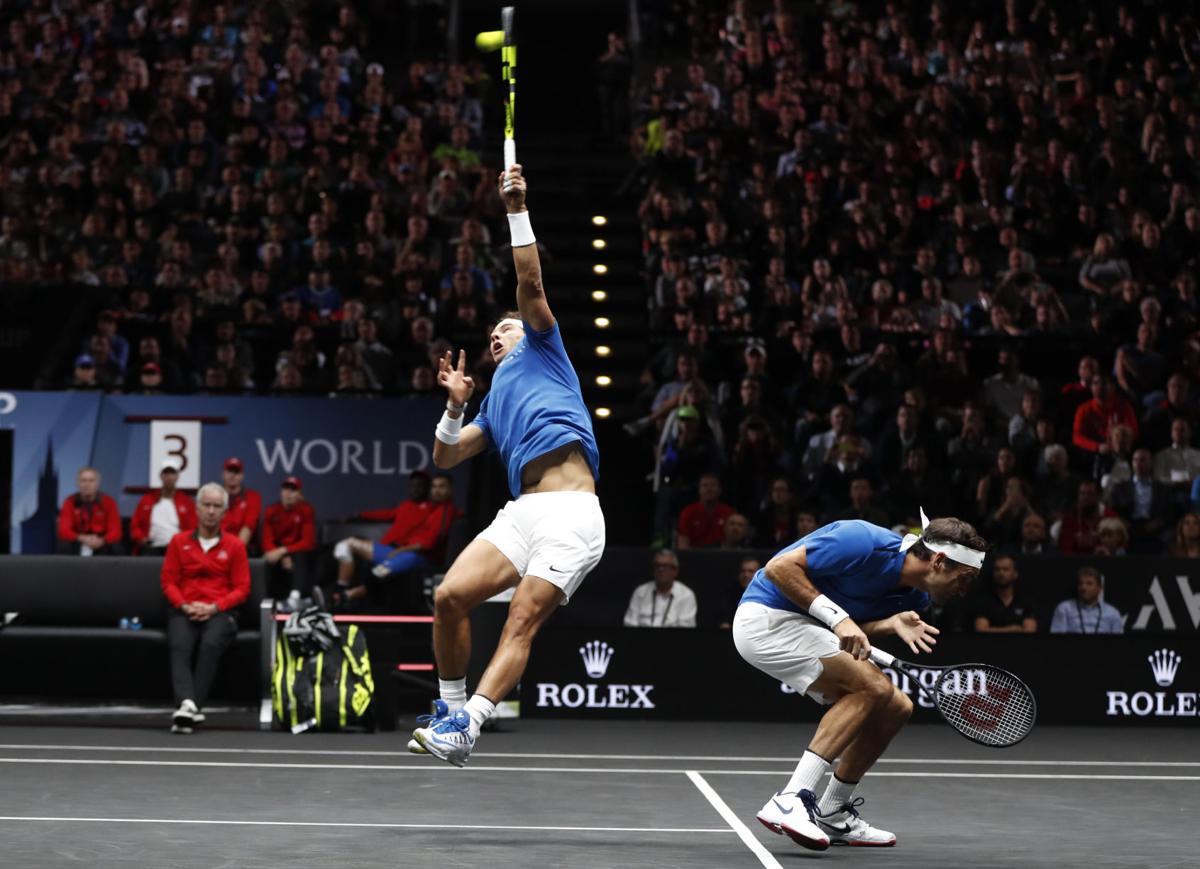 Nadal Federer Team Up For First Victorious Doubles Professional Sports Qconline Com