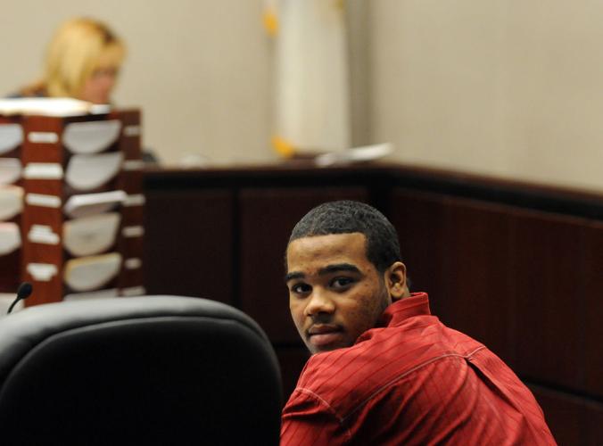 Jury returns split verdict in Henderson murder trial