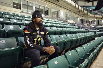 Full steam ahead: Quad City Steamwheelers' Keyvan Rudd leads on the turf, in the community