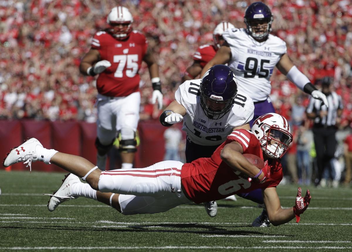 No 10 Wisconsin Holds Off Northwestern For 33 24 Win College