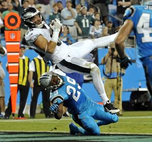 Wentz throws 3 TD passes, Eagles beat Panthers 28-23