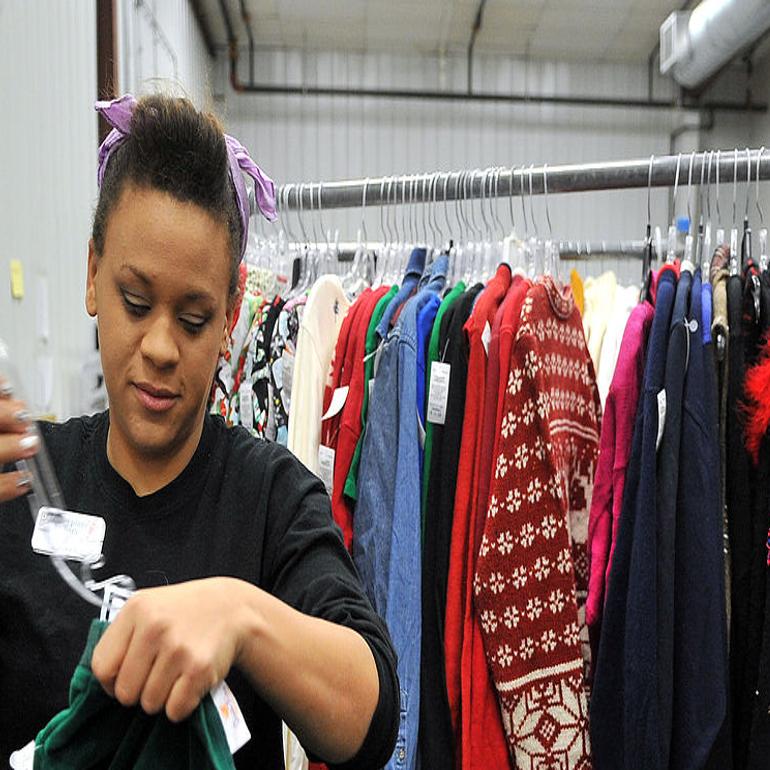 Spreading Goodwill Store Employee Enjoys Helping Others