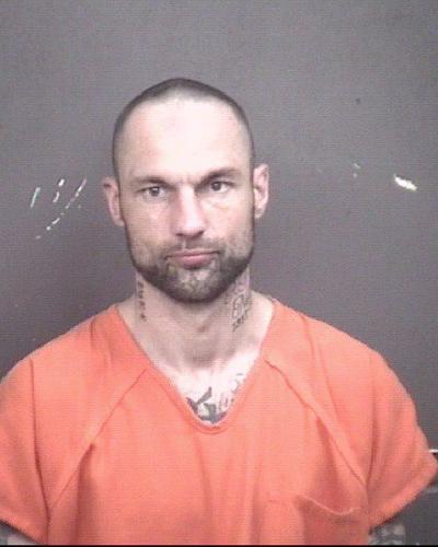 Moline man facing gun charge