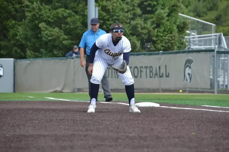 Softball claims first game in CCIW Tournament