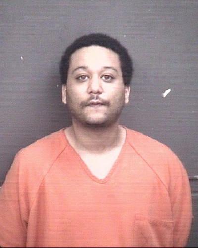 Man accused of striking another with a hammer