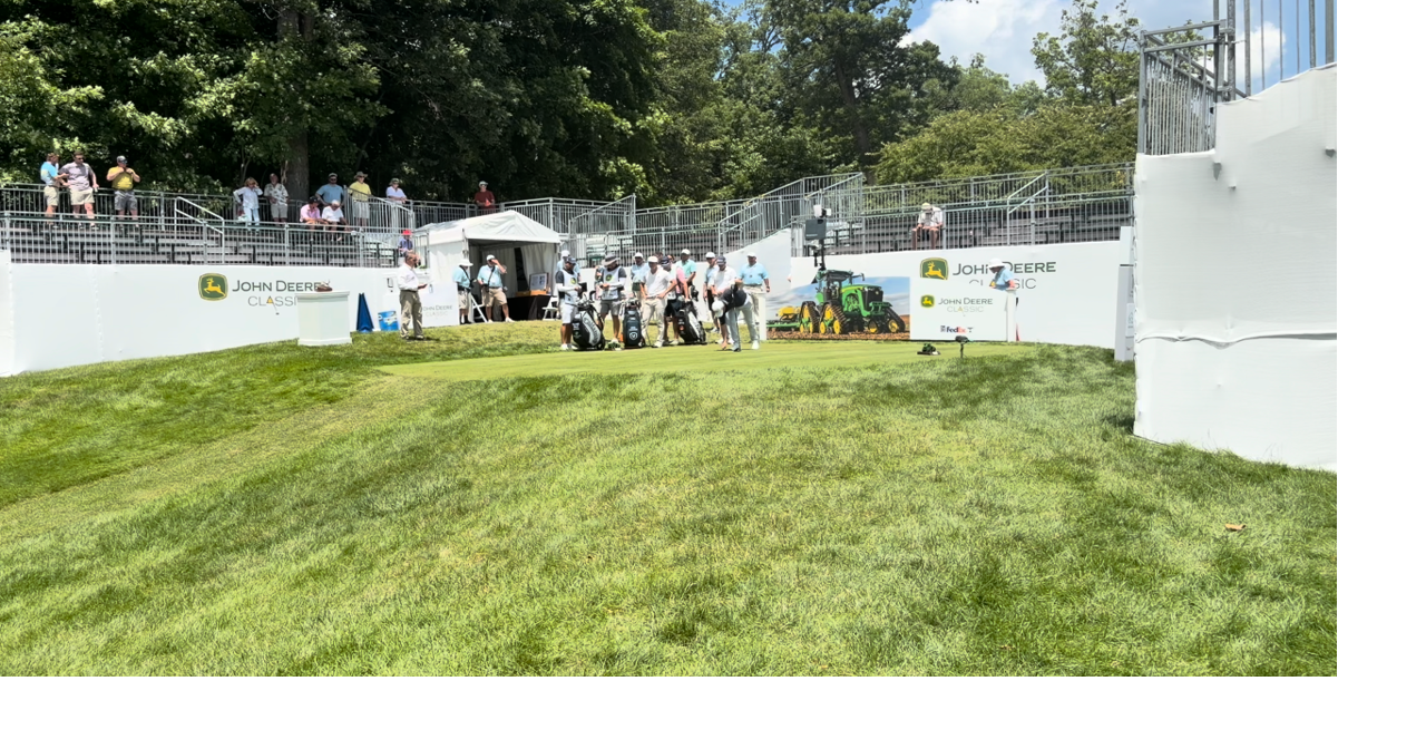 Scenes from the first hole at TPC Deere Run on day one of the John Deere Classic
