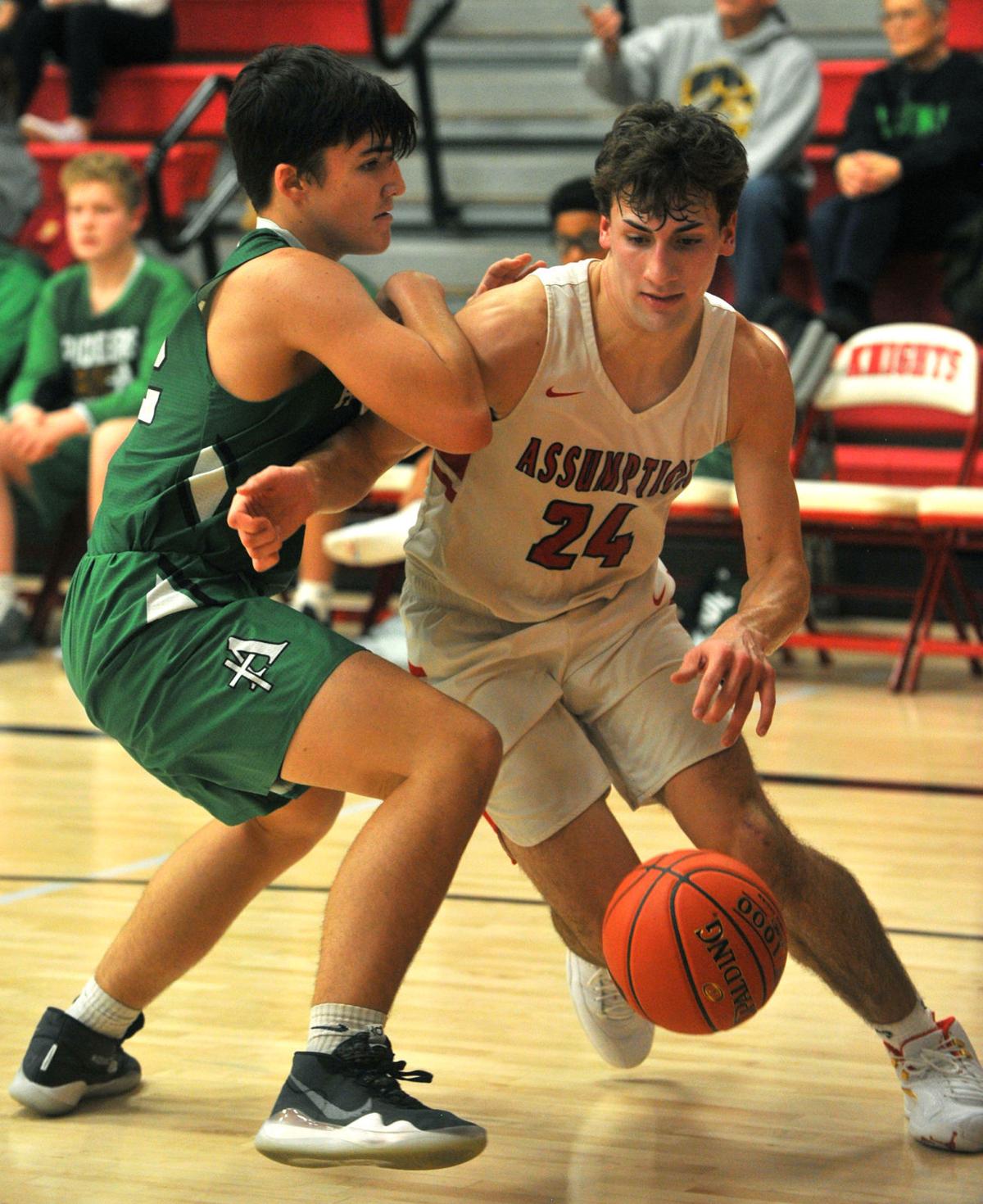 Knights Overwhelm Pioneers To Retain A Trophy Basketball