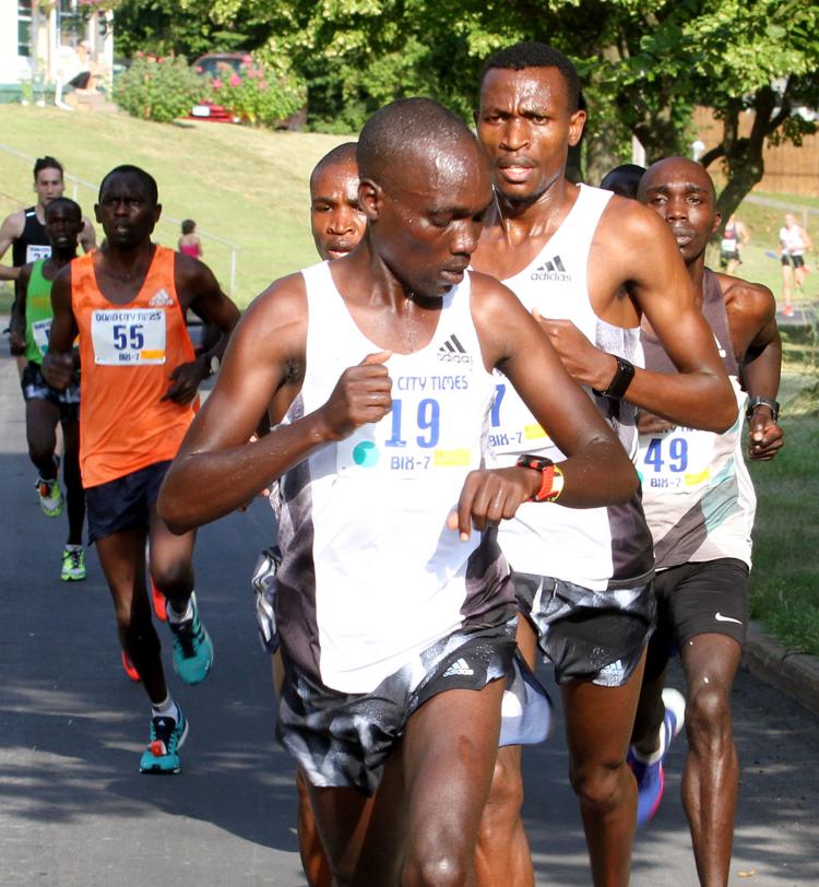 QuadCity Times Bix 7 By accident, 10yearold runs full Bix 7 race