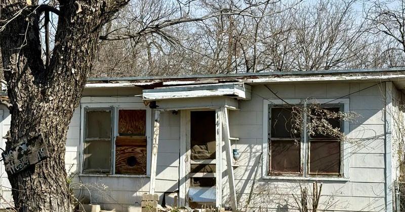 Tax foreclosure property at 1410 Parker St. on Wednesday.