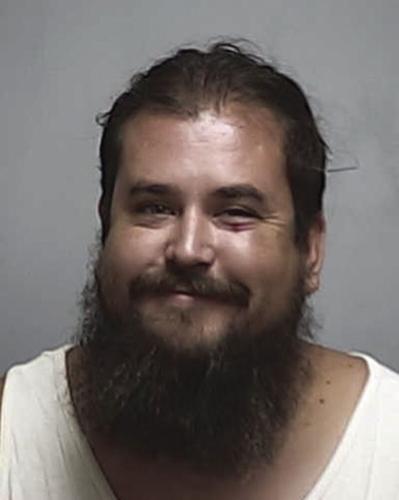 Man arrested after allegedly breaking down door with sledgehammer