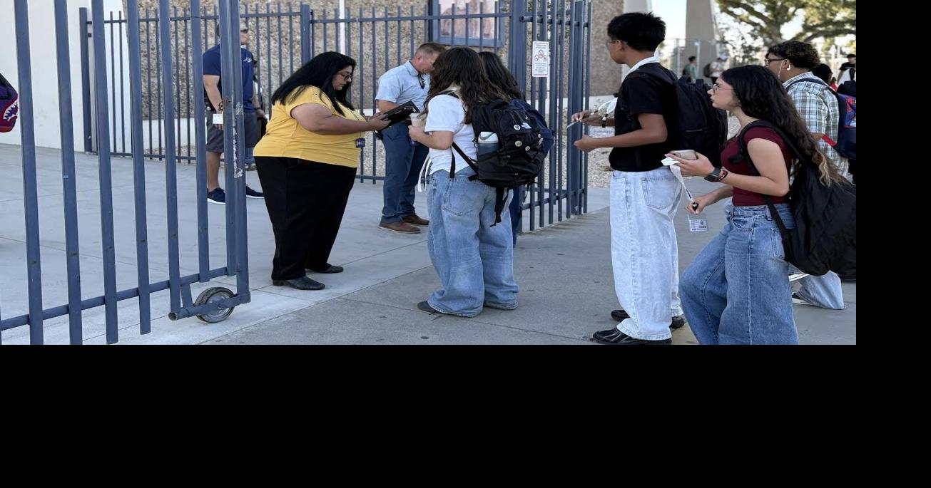 A New Day: Students show ID at Monache