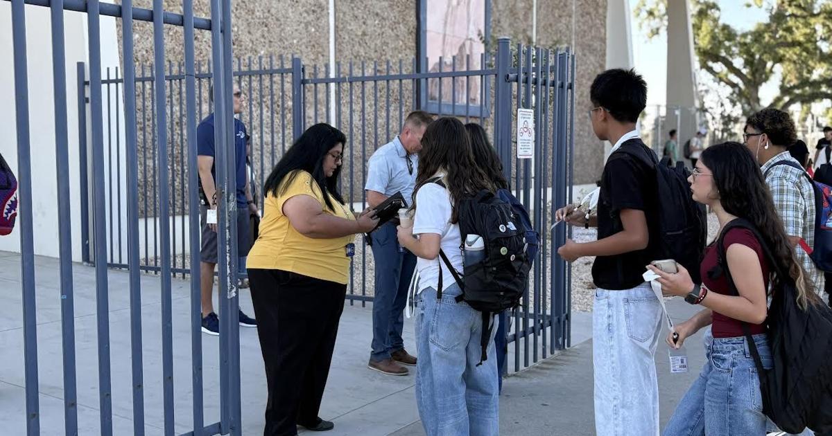 A New Day: Students show ID at Monache
