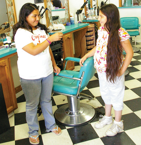 Zach Elementary students and staff donate hair to Locks of Love