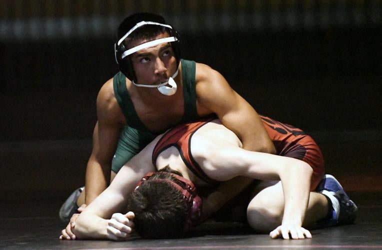 Boys Wrestling: Pins, forfeits give Grizzlies win