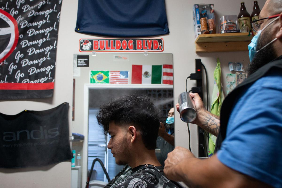 PHOTOS: Tito's Barbershop creates space in Athens for ...