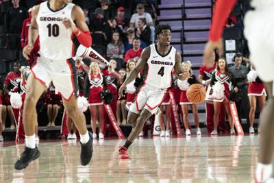 Georgia Men S Basketball Defeats Charlotte 77 69 For Second