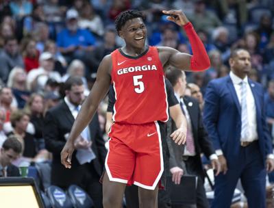 Anthony Edwards Georgia Bulldogs Unsigned Gestures to Crowd in Red Jersey  Photograph