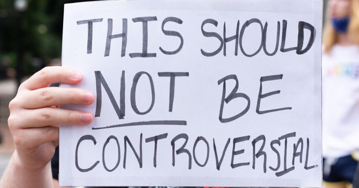 Controversial Sign Writing PHOTOS: Signs from Athens protests | Multimedia | redandblack.com