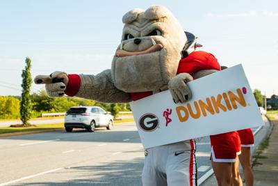 Dunkin' hosts pep rally to kick off UGA football season | Eat ...
