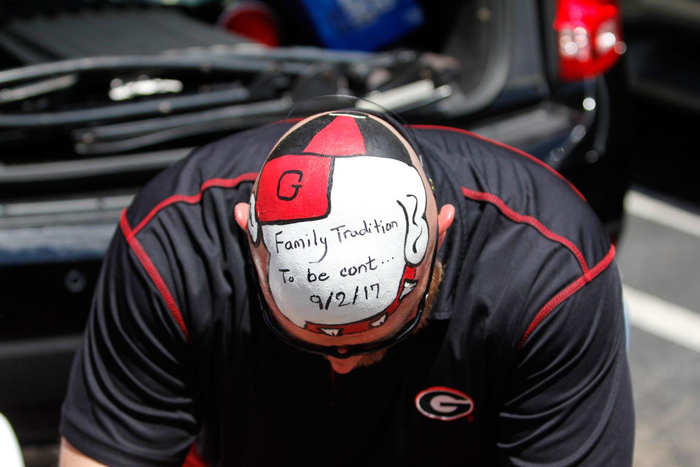 trent woods carries on his family s head painting tradition gday redandblack com