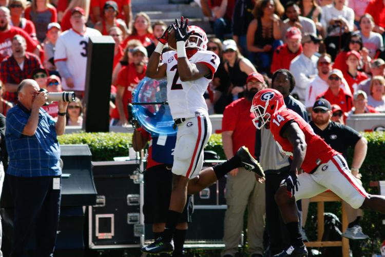 football looking to use surplus of tall wide receivers