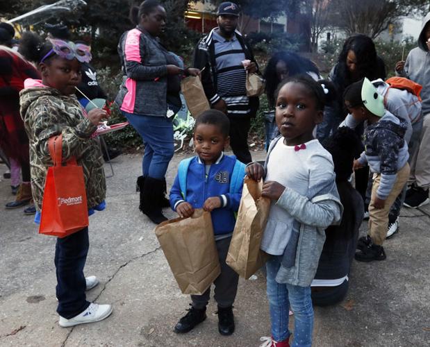 PHOTOS UGA housing, students open dorms for trickortreating by