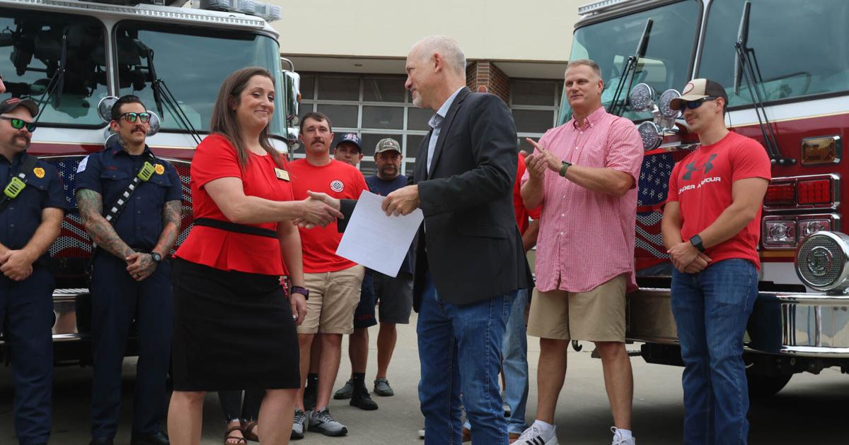 Athens firefighters celebrate collective bargaining rights in signing ...