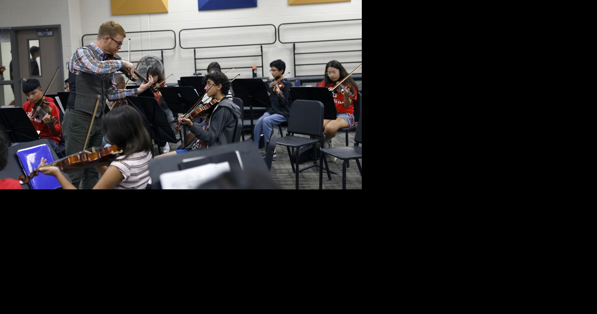 violin teacher of the year | | redandblack.com