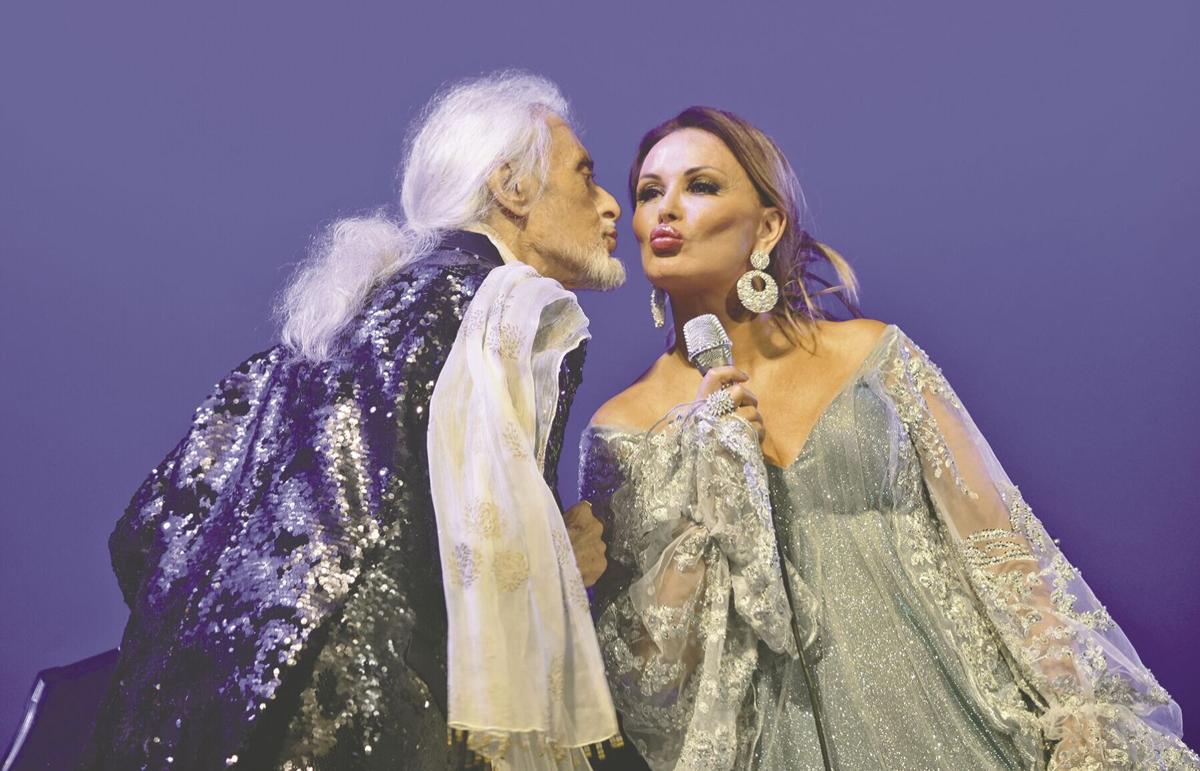 Frank Fetta shares an air kiss with Venetian vocalist Giada Valenti