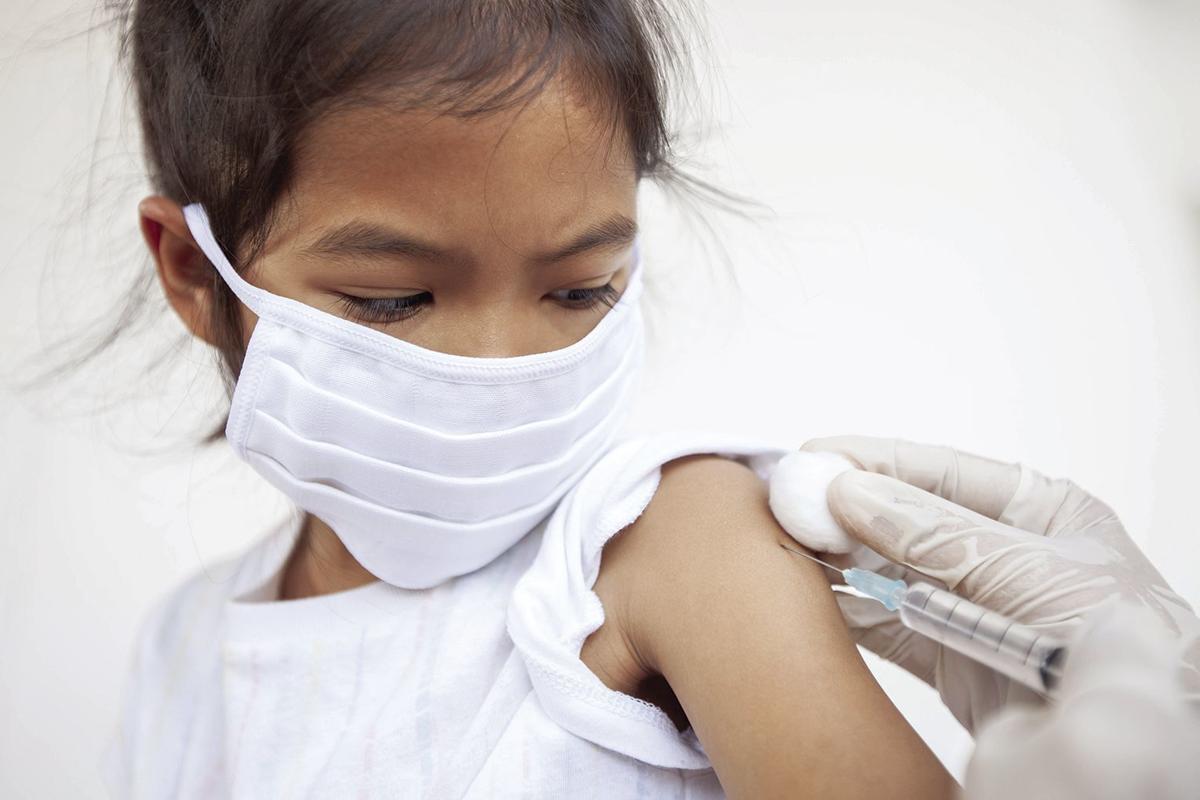 Girl receiving vaccine