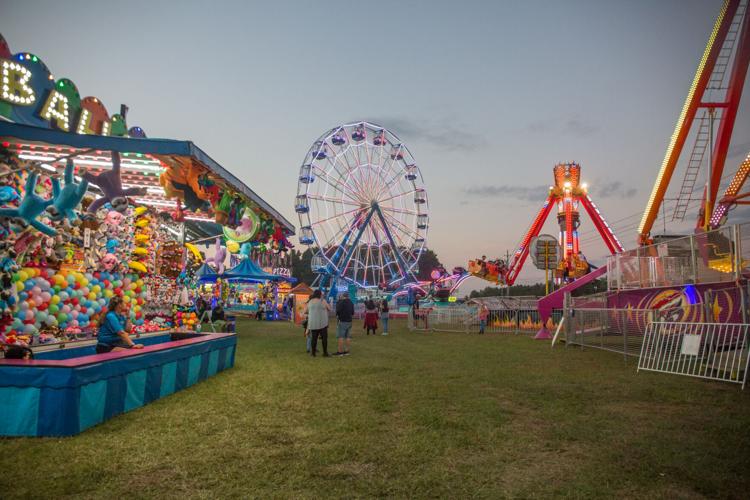 Fair stirs excitement, pride Crowds gather on first night for vendors