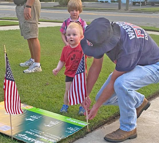 Warsaw firefighters commemorate 9/11 with flag display | News ...