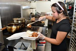 Filipino restaurant downtown serving customers