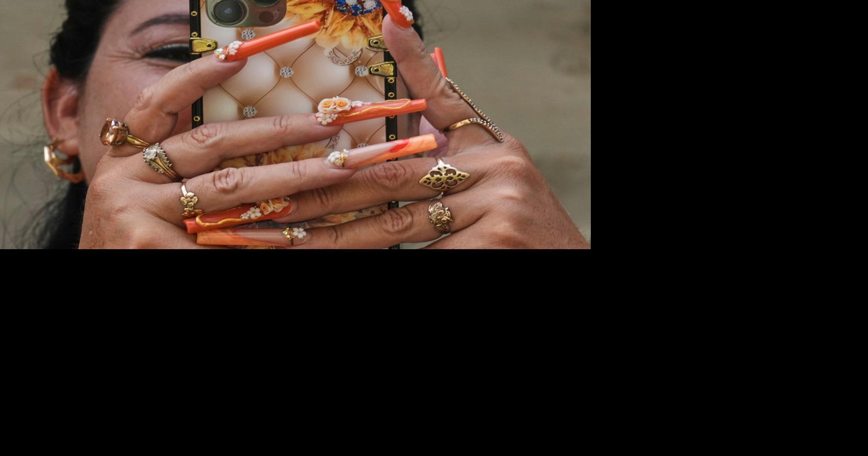 Photos of Cuban women embracing nail art as escape from economic crisis