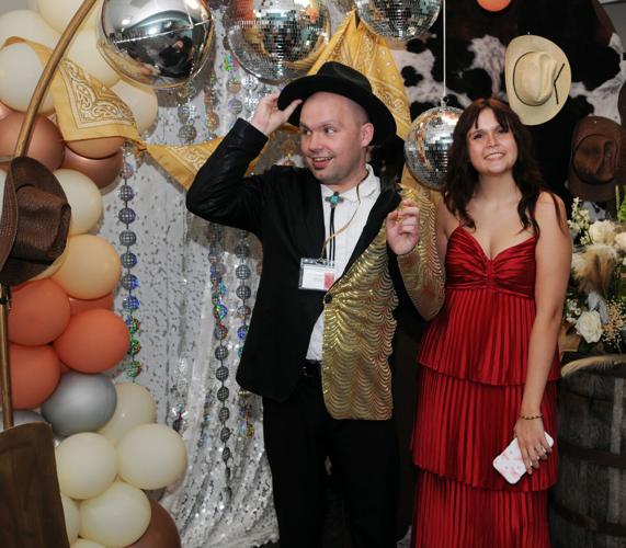 Back in the saddle: Western-themed event brings prom to adults with special  needs | Local News | reflector.com
