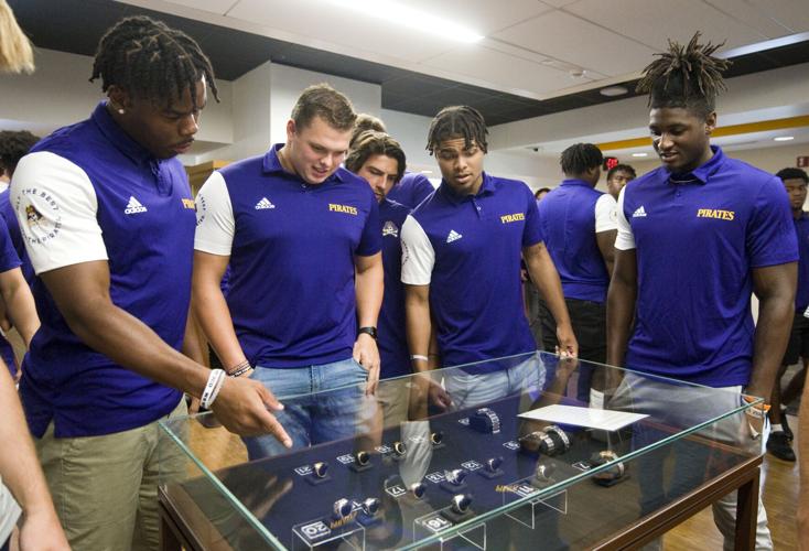 ECU football Coaches, players tour new football exhibit College