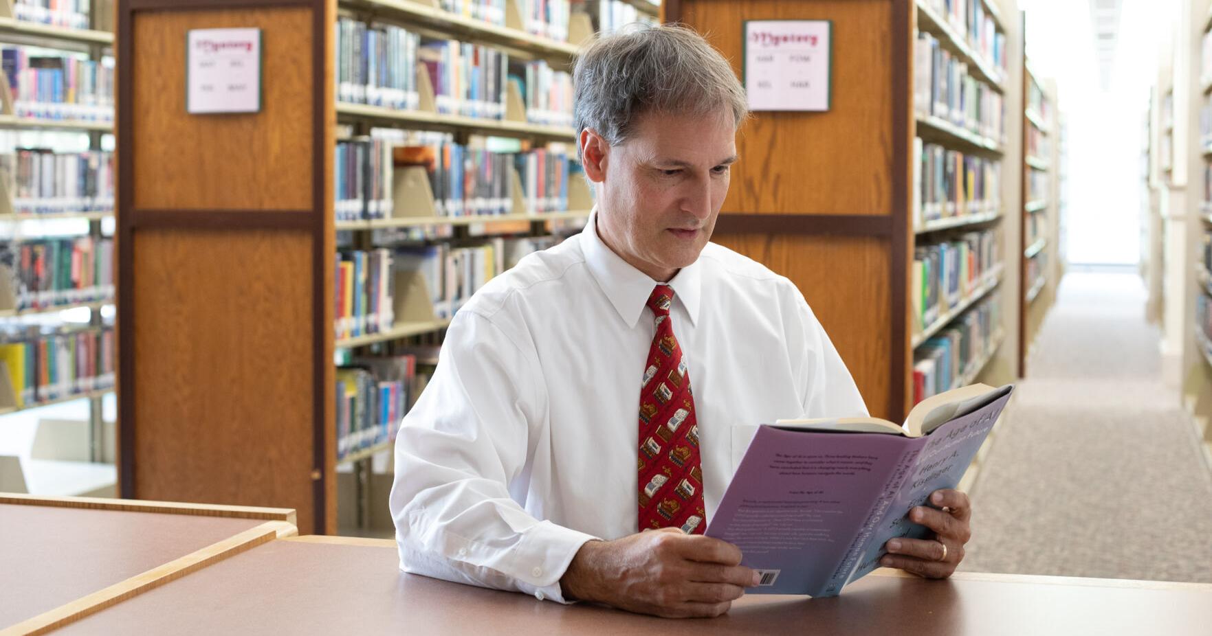 What are you reading? Technology aside, library director still prefers ink and paper - Vimarsana News