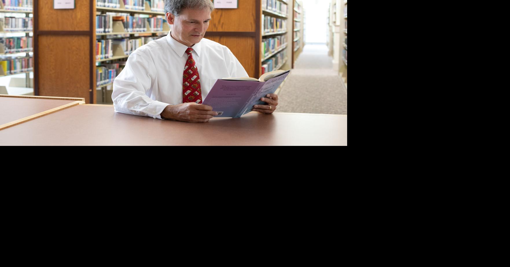 What are you reading? Technology aside, library director still prefers ...