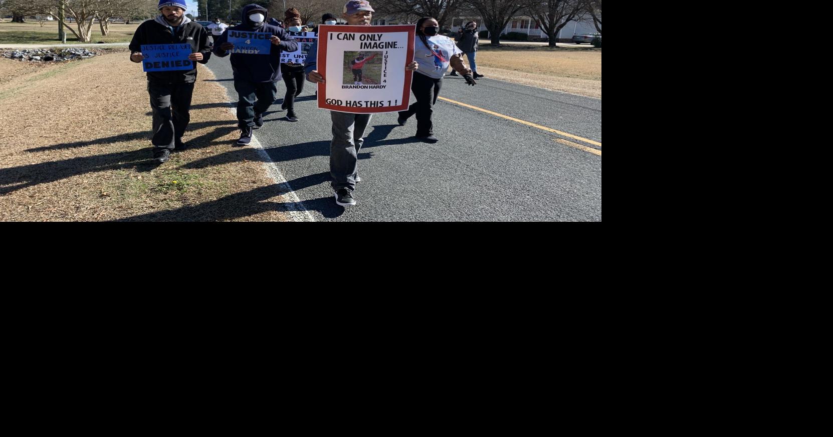 Supporters of man shot in Grimesland march in neighborhood where he was