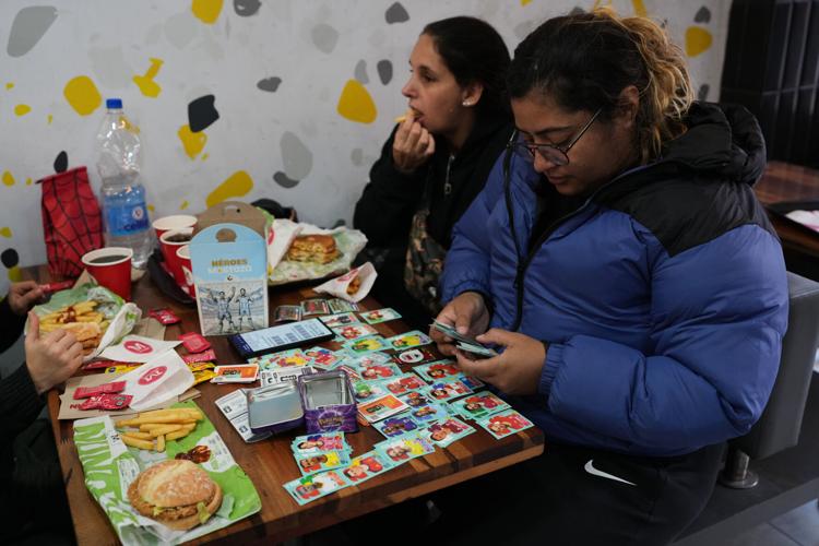 Argentine plazas buzz with World Cup sticker trading fever | National ...
