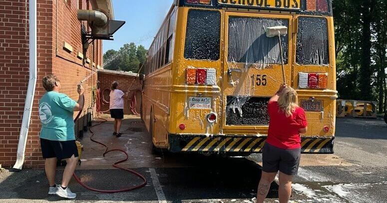 The wheels on the bus go 'round and 'round: Crew preps area school ...
