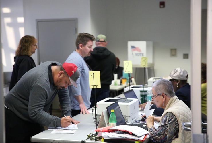 Voters brave long lines; campaigns parade into Pitt County Local News