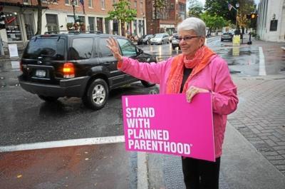 Planned Parenthood supporters hold rally at Four Corners