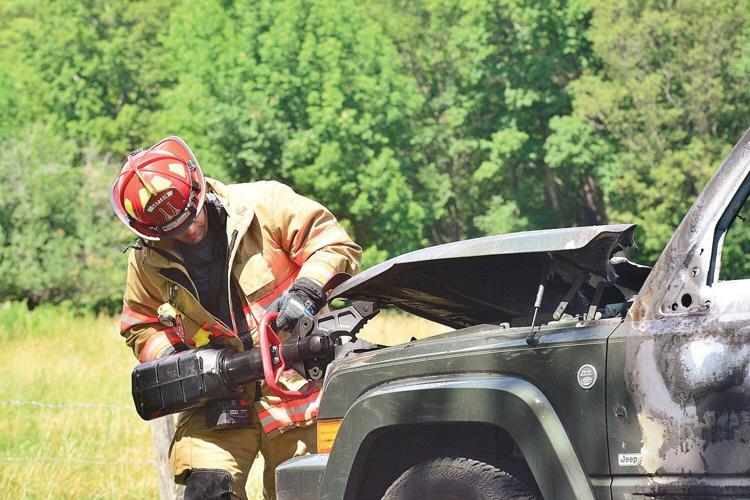 Photos: Vehicle fire draws quick response
