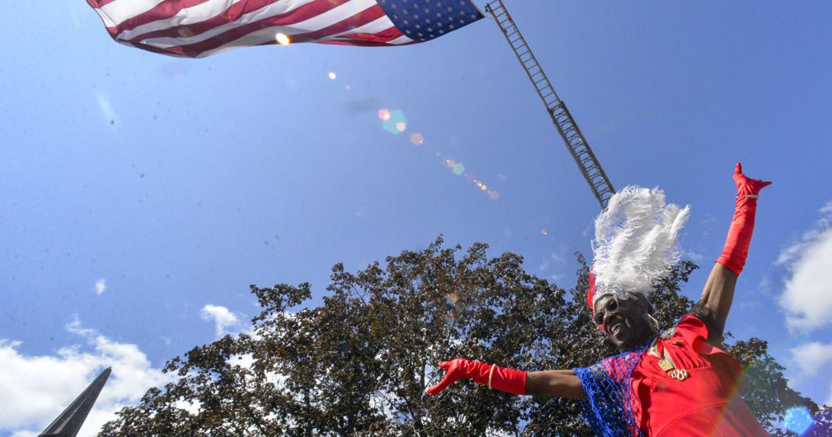 Red, white and bedazzled. Hughes keeps traditions alive at the Fourth of July parade