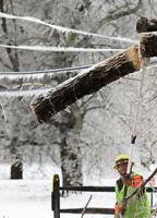 Icy roads, power outages, closed schools and businesses; winter storm settles over region
