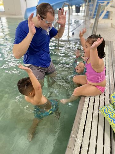 Local YMCA swim instructor and students
