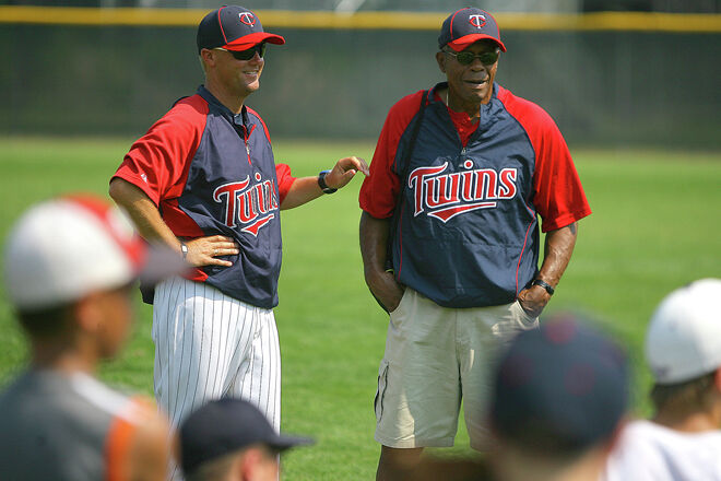 Justin Morneau and Rod Carew stop by Twins spring training